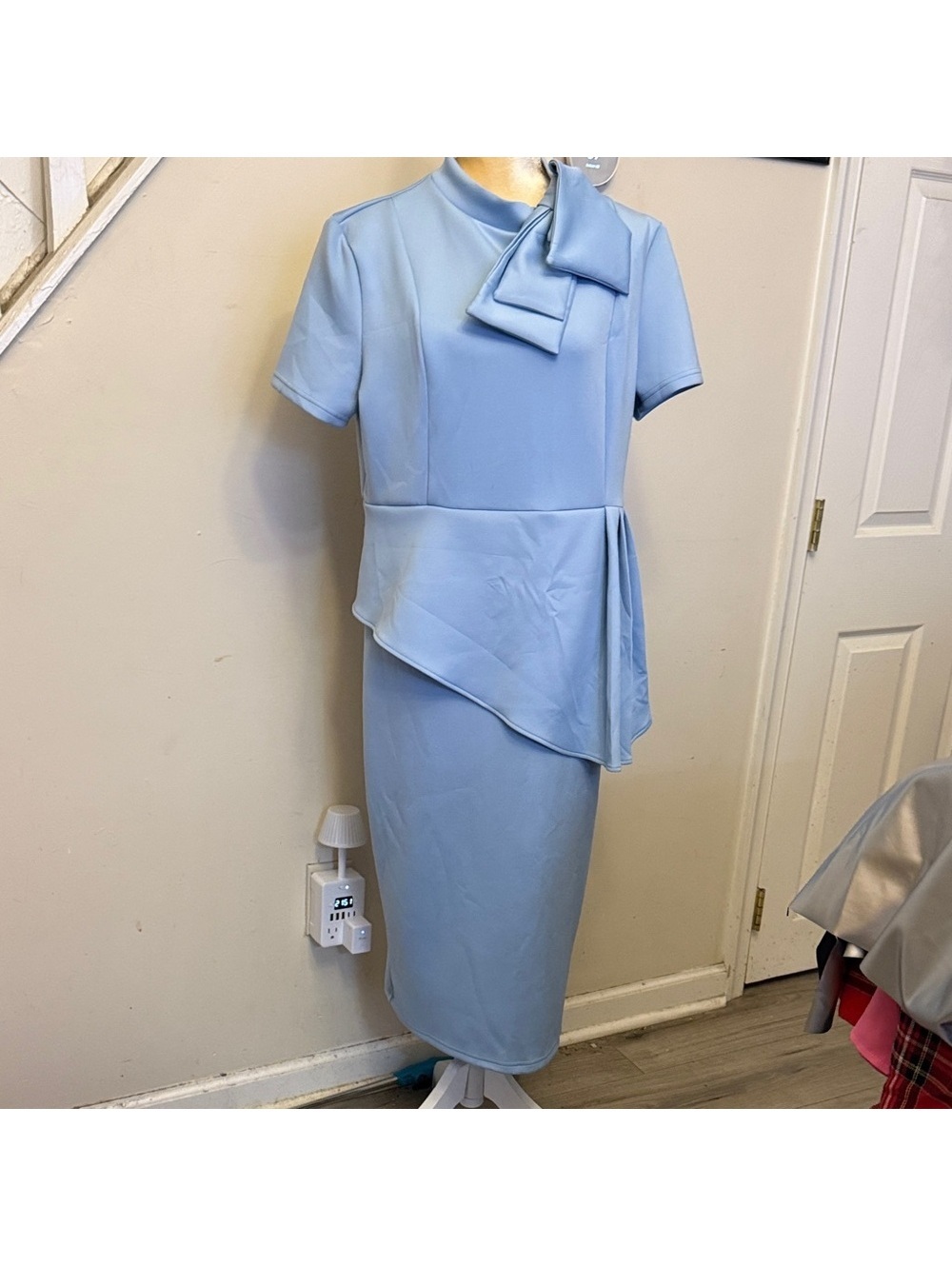 Elegant Light Blue Midi Dress with Asymmetrical Peplum